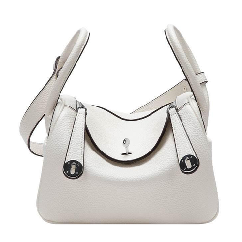 Pale Milky Off White Pebble Grain Rounded Compact Shoulder Bag With Polished Silvery Turn Lock Hardware And Blush Toned Inner Lining