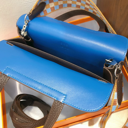 Deep Earthy Brown Vivid Bright Blue Color Block Compact Rectangular Flap Bag With Sleek Silvery Buckle Hardware And Dual Separate Carrying Straps