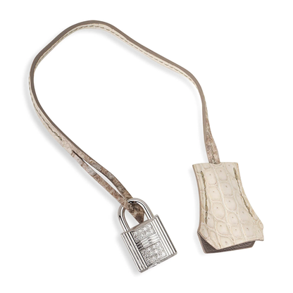 Gradient Snow White Ash Taupe Scaled Medium Trapezoid Hand Tote With Crystalline Encrusted Silvery Twist Lock Hardware And Matching Ornate Suspended Padlock Charm